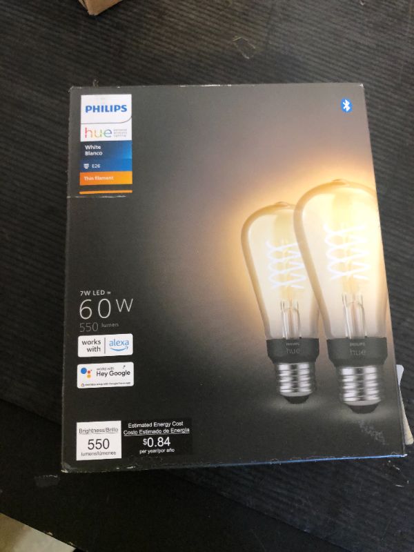 Photo 1 of Philips Hue Smart 60W ST19 Filament LED Bulb - Soft Warm White Light - 2 Pack - 550LM - E26 - Indoor - Control with Hue App - Compatible with Alexa, Google Assistant and Apple Homekit.