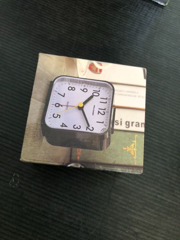 Photo 1 of Peakeep Small Battery Operated Analog Travel Alarm Clock Silent No Ticking, Lighted on Demand and Snooze, Beep Sounds, Gentle Wake, Ascending Alarm, Easy Set (Black)