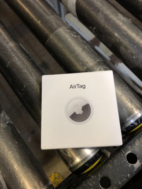 Photo 1 of Apple AirTag. Keep Track of and find Your Keys, Wallet, Luggage, Backpack, and More. Simple one-tap Set up with iPhone or iPad