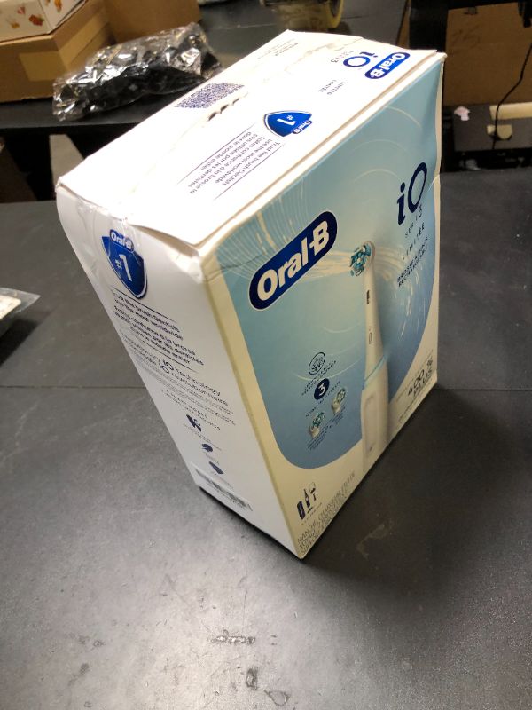 Photo 1 of Oral-B iO Deep Clean Rechargeable Electric Powered Toothbrush, White with iO Series 3 Limited, 2 Brush Heads and Travel Case - Pressure Sensor to Protect Gums - 3 Cleaning Settings - 2 Minute Timer