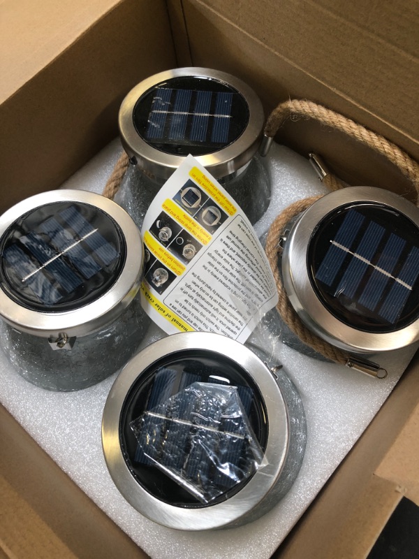 Photo 1 of Cooo 4 Pack Heavy Crackle Glass Solar Lantern with 30 LED Firefly Lights– Waterproof Outdoor Hanging Lamp 215% Larger Solar Panel, Stainless Steel Lid Decorative Lighting for Garden Patio Table