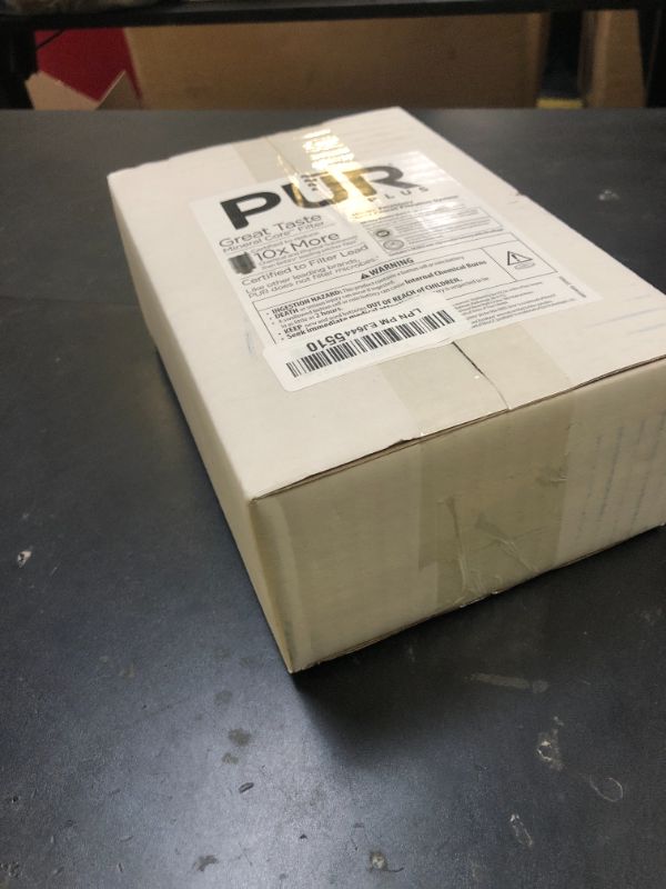 Photo 1 of PUR PLUS Vertical Faucet Mount Water Filtration System, Lead-Reducing Filter, Great-Tasting Water, Easy Install, Lasts 100 Gallons, Compatible with Sinks with External Aerators, Grey