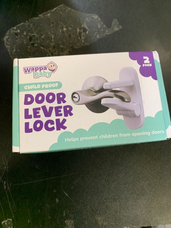 Photo 1 of Door Lever Lock (2 Pack) – Prevents Toddlers from Opening Doors – Easy One-Hand Operation for Adults – Durable ABS with 3M Adhesive Backing – No Tools Needed for Install