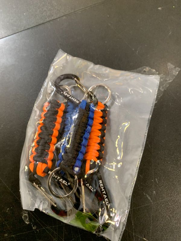 Photo 1 of REHTAEL Keychain Paracord Carabiner Men/Women, Military Braided Heavy Duty Key Chain w/Belt Clip D-Ring for Car Keys, Keychain Strap for Backpack Camping Hiking, 4Pcs (2*Black Blue & 2*Black Orange)