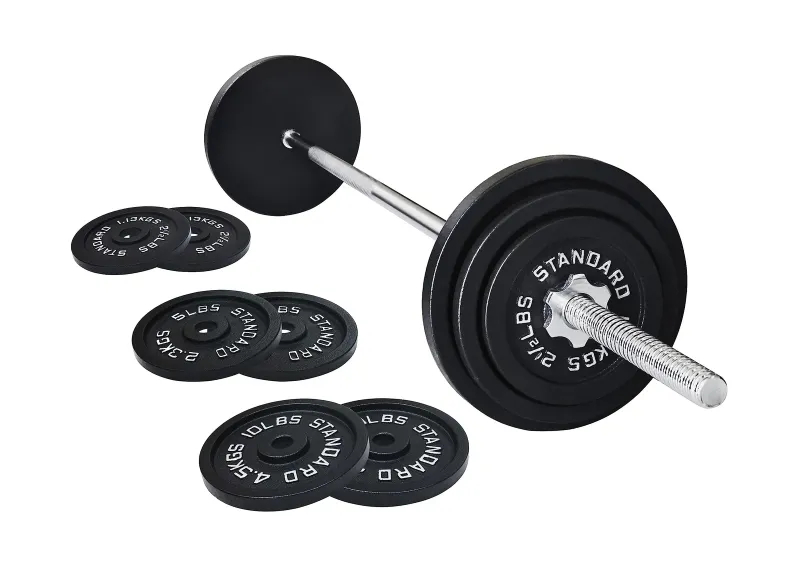 Photo 1 of Signature Fitness Cast Iron Standard Weight Plates Including 5FT Standard Bar...