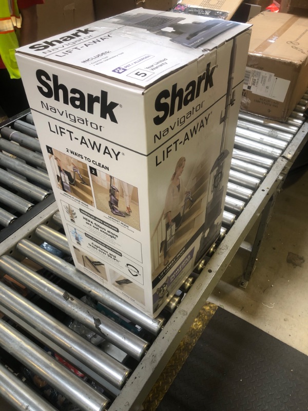 Photo 1 of Shark NV352 Navigator Lift Away Upright Vacuum, Hepa Filter, Anti-Allergen Technology, Swivel Steering, Ideal for Carpet, Stairs, & Bare Floors, with Wide Upholstery & Crevice Tools, Lavender