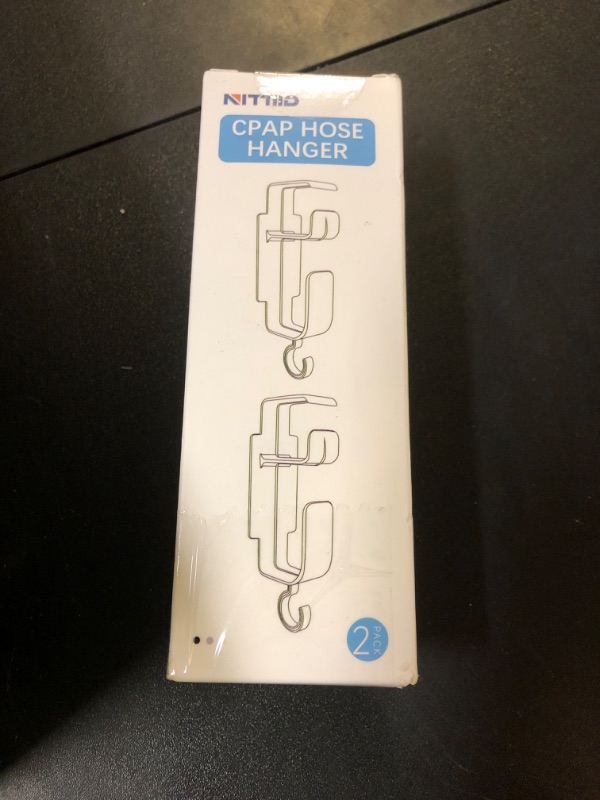 Photo 1 of NITTIID 2 Pack CPAP Hose Holder for Bed, CPAP Hose Hanger for Tube & Mask with Anti-Unhook Feature Hose Organizer Avoids Hose Tangle and Help You Sleep Better CPAP Hook with Free Strips