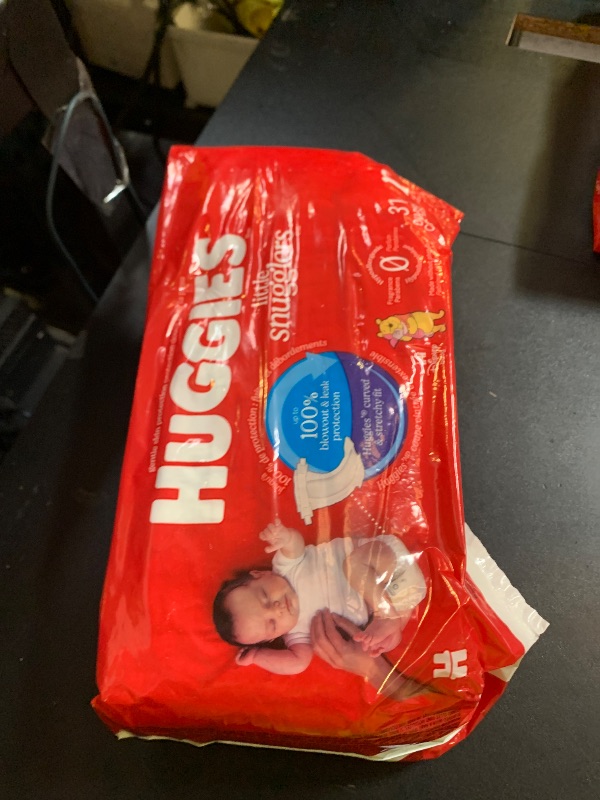 Photo 1 of Huggies Size Newborn Diapers, Little Snugglers Baby Diapers, Size Newborn (up to 10 lbs), 31 Count, Packaging May Vary