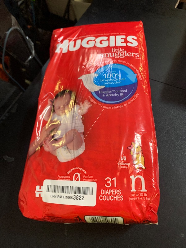 Photo 1 of Huggies Size Newborn Diapers, Little Snugglers Baby Diapers, Size Newborn (up to 10 lbs), 31 Count, Packaging May Vary