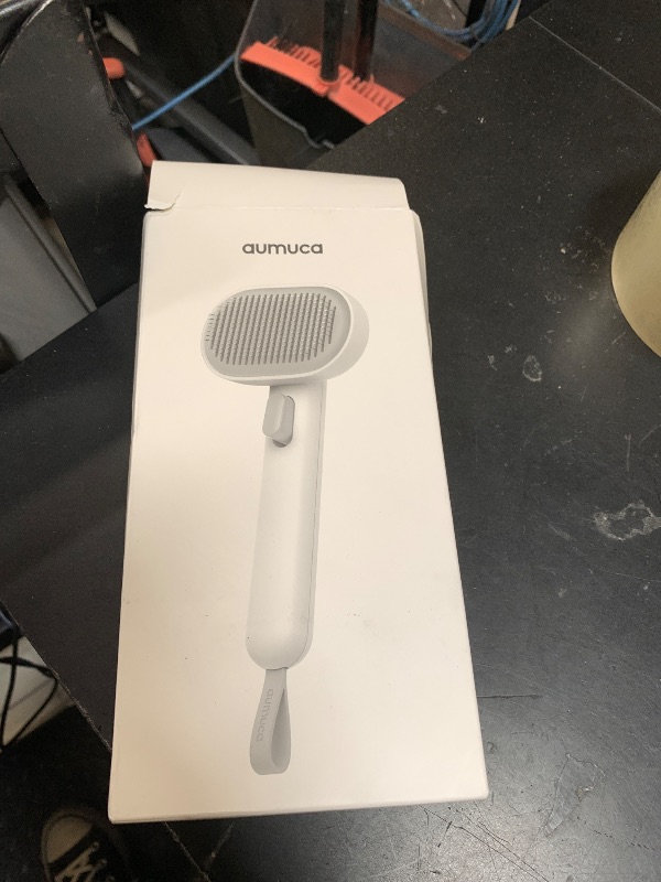 Photo 1 of aumuca Cat and Dog Grooming Brush for Shedding, Removes Loose Fur from Long or Short Haired Pets - Ideal for Cats, Kittens, Rabbits, and More - Purple