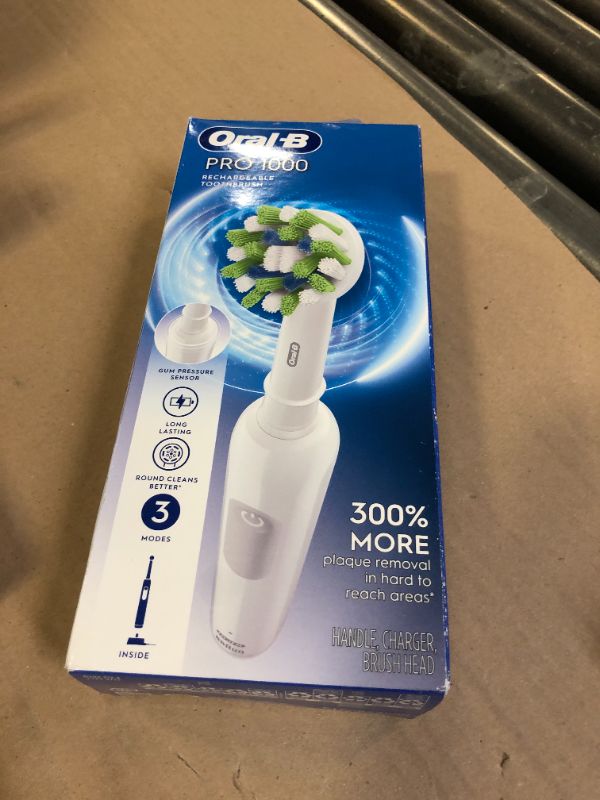Photo 1 of Oral-B Pro 1000 Rechargeable Electric Toothbrush, White