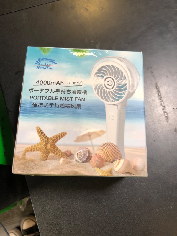Photo 1 of HandFan 4000mAh Portable Misting Fan, 50ml Water Tank, Rechargeable Handheld Personal Mister Fan, Spray Water Mist, Foldable Electric Hand Fans for Beach, Travel, Outdoors(White)