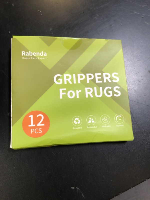 Photo 1 of Rabenda 12 Pcs Rug Tape, Non Slip Rug Pads Grippers for Hardwood Floors and Tiles, Reusable Carpet Tape for Area Rugs, Double-Sided Adhesive Rug Stickers Keep Corners Flat (Black)