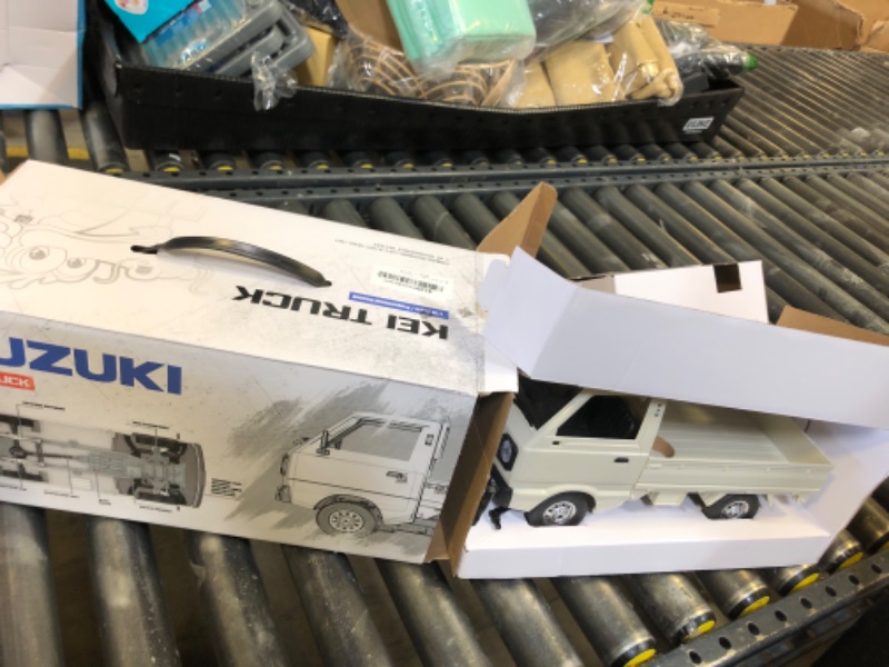 Photo 1 of WPL D14 RC Drift Car 1/10 4WD Off Road Truck 2.4 GHz Remote Control 4x4 Kei Truck with 280 Motor, Proportional Throttle & Steering, Hobby Grade Vehicle RTR for Adults