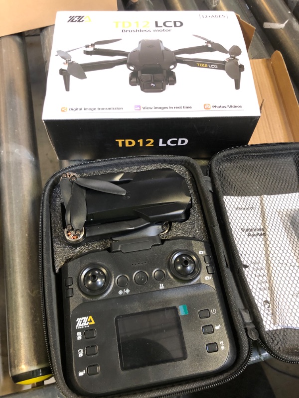 Photo 1 of Toladrone TD12LCD Drone with Camera, Foldable RC Drone with LCD Screen Remote Control Brushless Motor Dron Optical Flow Positioning Drones for Adults Quadcopter for Beginners