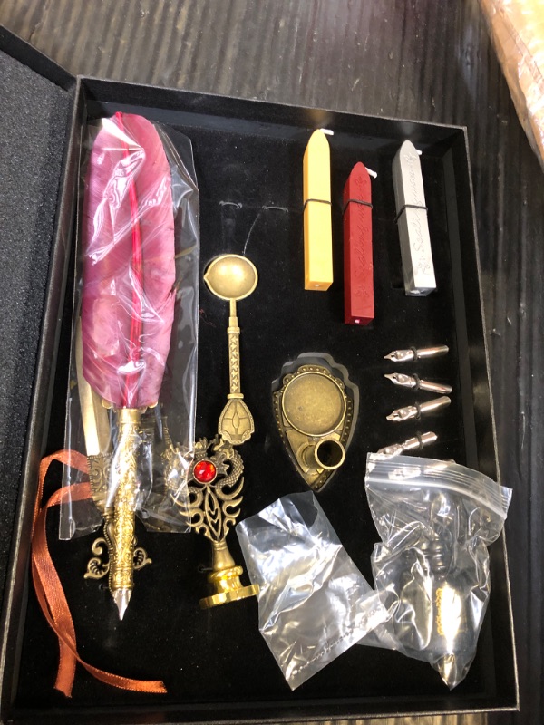 Photo 1 of Karhood Quill Pen and Ink Set - Feather Calligraphy Dip Pen with Wax Seal Stamp Kit and 5 Nibs (Red)