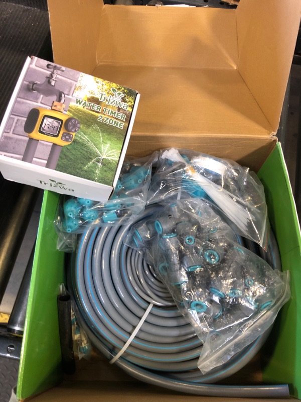 Photo 1 of TRJZWA Drip Irrigation System Kit with Automatic Water Timer 2 Zone 150FT,New Anti-Leakage Quick Connector for Garden,Lawn,1/2 inch Hose and 1/4 inch Distribution Tubing and Accessories