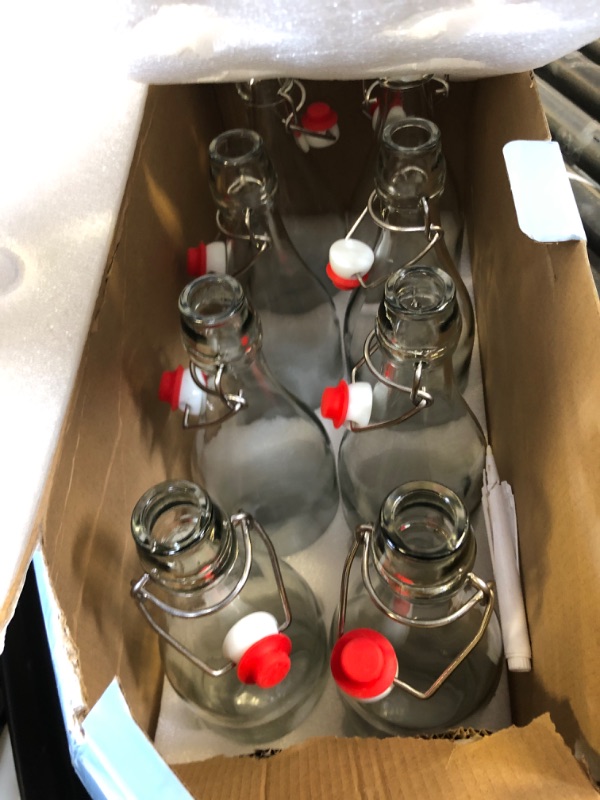 Photo 1 of Encheng 32 oz Clear Glass Bottles With Air Tight Lids, Easy Cap for Beer and Home Brewing, Kombucha With Stoppers, Swing Top for Beverages 8 Pack