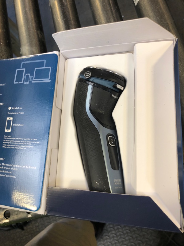 Photo 1 of Philips Norelco Shaver 3600 Series, Wet and Dry Electric Shaver, P-Cap, Travel Pouch, Storm Blue, Model S3243/91