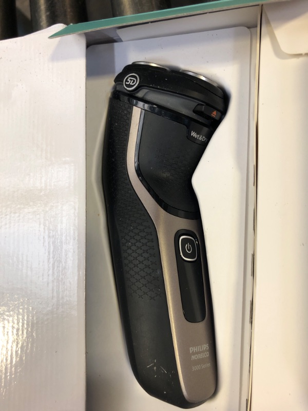 Photo 1 of Philips Norelco Shaver 3600 Series, Wet and Dry Electric Shaver, P-Cap, Travel Pouch, Ash Gold, Model S3242/90