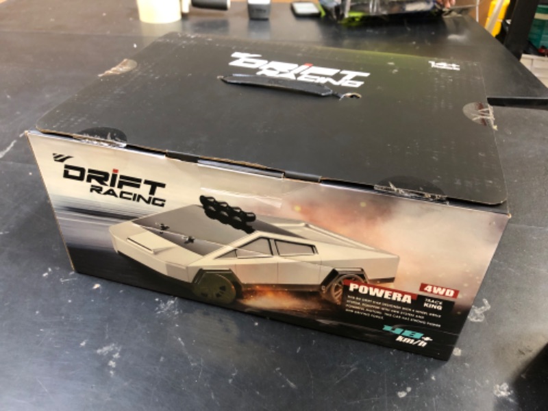 Photo 1 of Remote Control Car 4 WD Ultra-Fast Drifting RC Cars for Car Racing Track 2.4 GHz 65KPH 360 Drifting Electric Powered High Speed Race Car for 14+ with Off-Road Tire