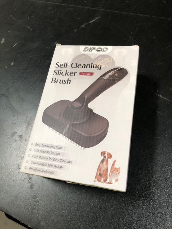 Photo 1 of Dipoo Self Cleaning Shedding Brush - Skin Friendly Grooming Tool for Dogs, Cats, and Puppies, Deshedding and Hair Removal for Long and Short Haired Pets, Black