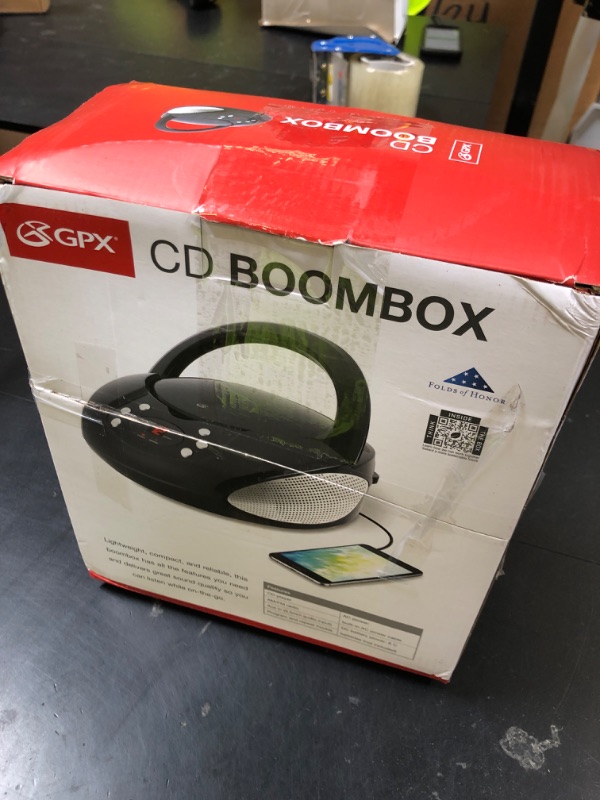 Photo 1 of GPX, Inc. Portable Top-Loading CD Boombox with AM/FM Radio and 3.5mm Line in for MP3 Device - Black