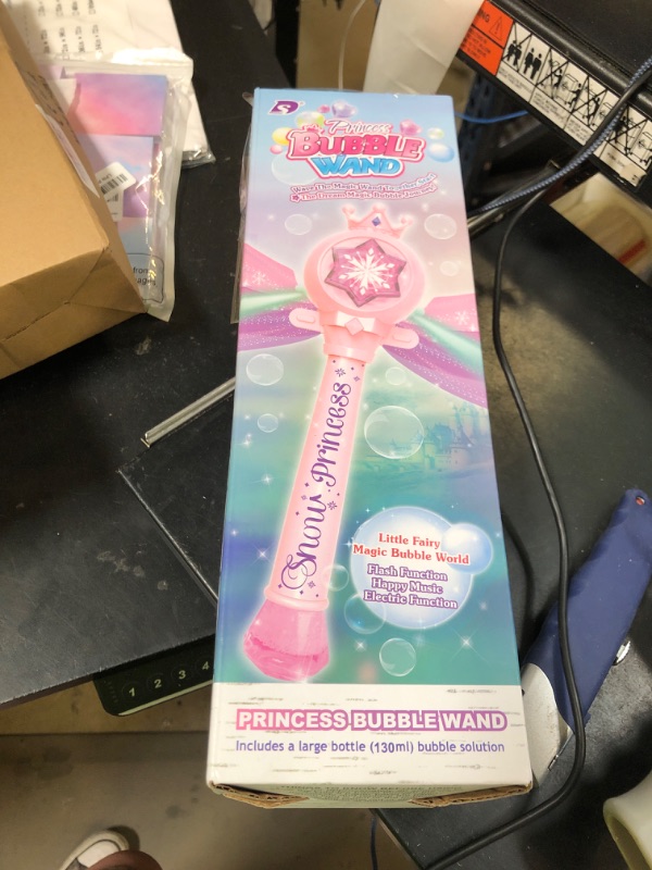 Photo 1 of Britik Bubble Wands for Kids Girls - LED Light & Music Bubble Machine: 3 AA Batteries & 2 Bubble Solutions, Outdoor Party Birthday Toys for Toddlers, Gift for 3 4 5 6 7 8 Year Old Girls