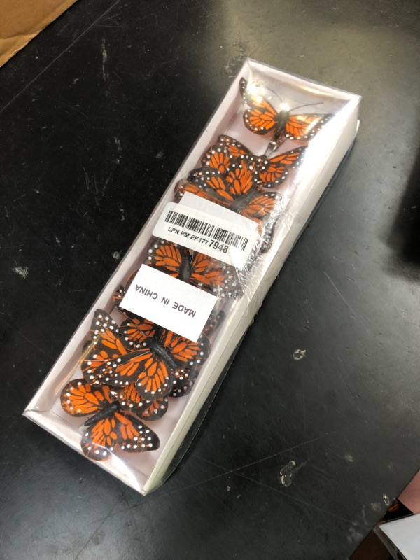 Photo 1 of 12Pcs Monarch Butterfly Clip on Decorations 2.7inches Small Orange Artificial Feather Butterflies for Flower Arrangements Birthday Party Wedding Ornaments Hair Crafts Spring Tree Decor