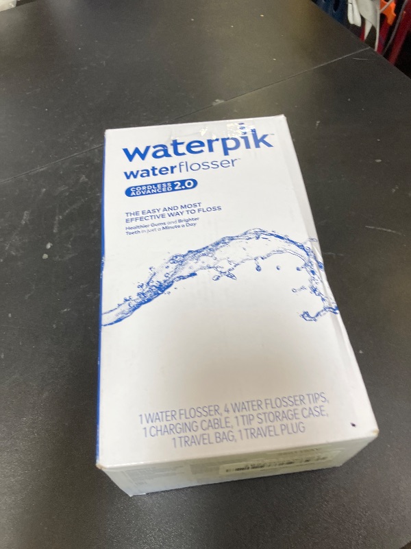 Photo 1 of Waterpik Cordless Advanced 2.0 Water Flosser For Teeth, Gums, Braces, Dental Care With Travel Bag and 4 Tips, ADA Accepted, Rechargeable, Portable, and Waterproof, Blue WP-583, Packaging May Vary