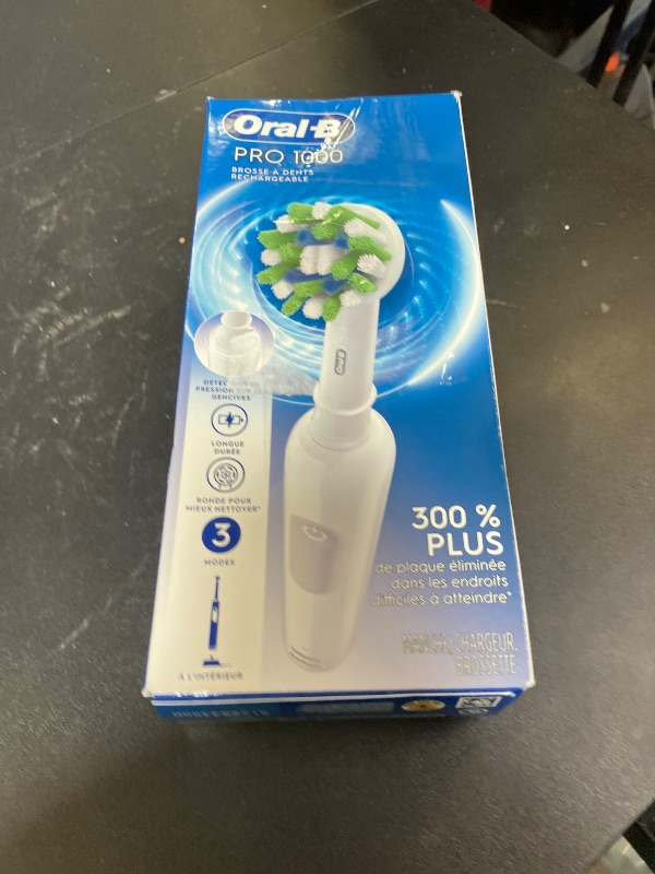 Photo 1 of Oral-B Pro 1000 Rechargeable Electric Toothbrush, White