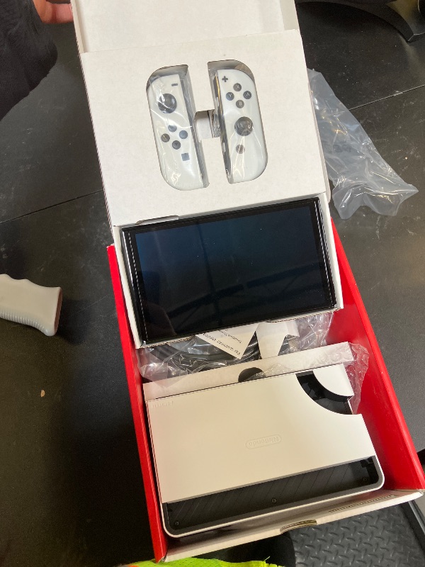 Photo 1 of Nintendo Switch – OLED Model w/White Joy-Con