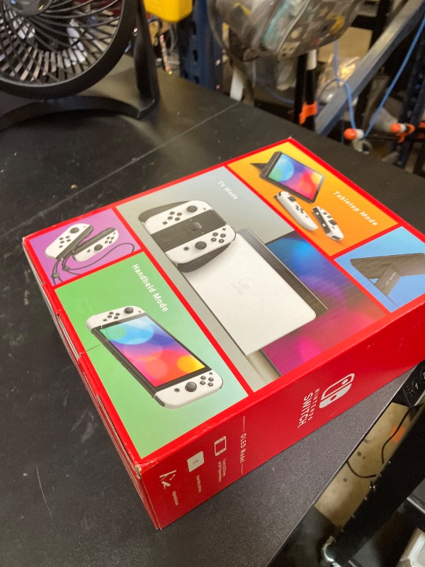 Photo 1 of Nintendo Switch – OLED Model w/White Joy-Con