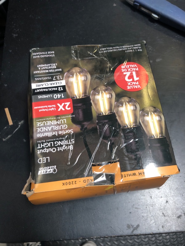 Photo 1 of Feit Electric S14 LED Filament Light Bulbs, High Output, 2200K Warm White, 140 Lumens, String Light Replacement Bulbs, 15,000-Hour Lifespan, Clear Durable Housing, S14HO/822/FIL/12 (Pack of 1)