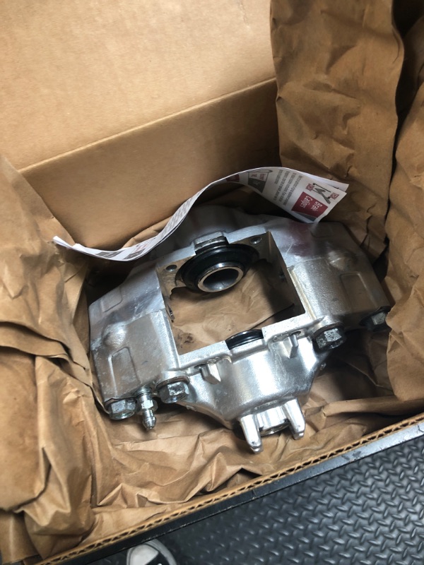 Photo 1 of Cardone 18-B5002A Remanufactured Unloaded Disc Brake Caliper with Bracket