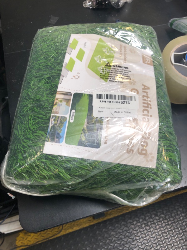 Photo 1 of Pad For Dogs 39.3 x 31.5 inches Strong Absorbency Soft Artificial Grass for Pets Potty Training, Easy to Clean Fake Grass for Dog Indoor Outdoor Use(1 Pack)
