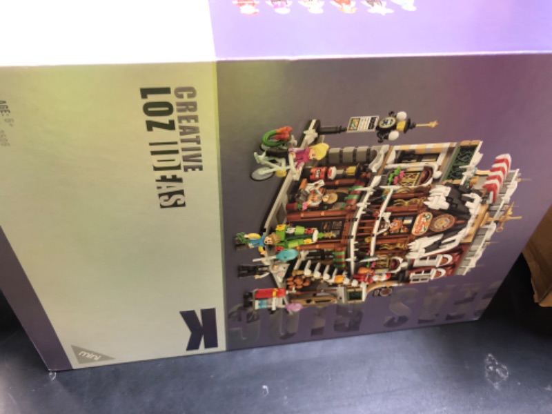 Photo 1 of LUOGFYNI Mini Christmas Cafe Shop Building Blocks Set, Holiday Main Street View Architecture Model, Merry Christmas Toy Gifts for Adults, Mini Bricks Coffee Construction (2506pcs)