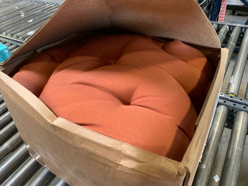 Photo 1 of orange outdoor patio cushion 