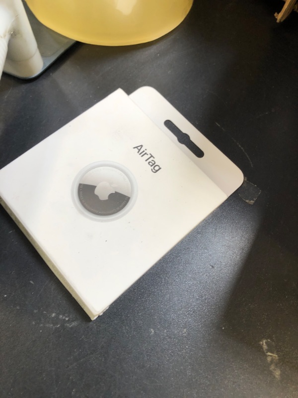 Photo 1 of Apple AirTag. Keep Track of and find Your Keys, Wallet, Luggage, Backpack, and More. Simple one-tap Set up with iPhone or iPad