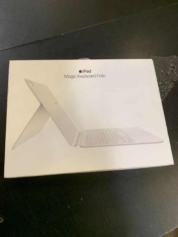 Photo 1 of Apple Magic Keyboard Folio: iPad Keyboard and case for iPad (A16 and 10th Generation), Detachable Two-Piece Design That attaches magnetically, Built-in trackpad, US English – White
