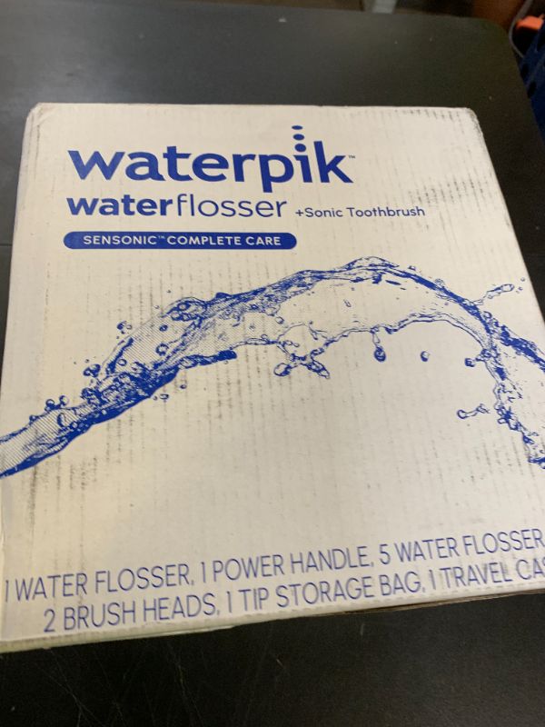 Photo 1 of Waterpik Sensonic Complete Care Water Flosser and Rechargeable Electric Toothbrush Combo Set for Teeth Cleaning and Flossing, CC-04, White, Packaging May Vary