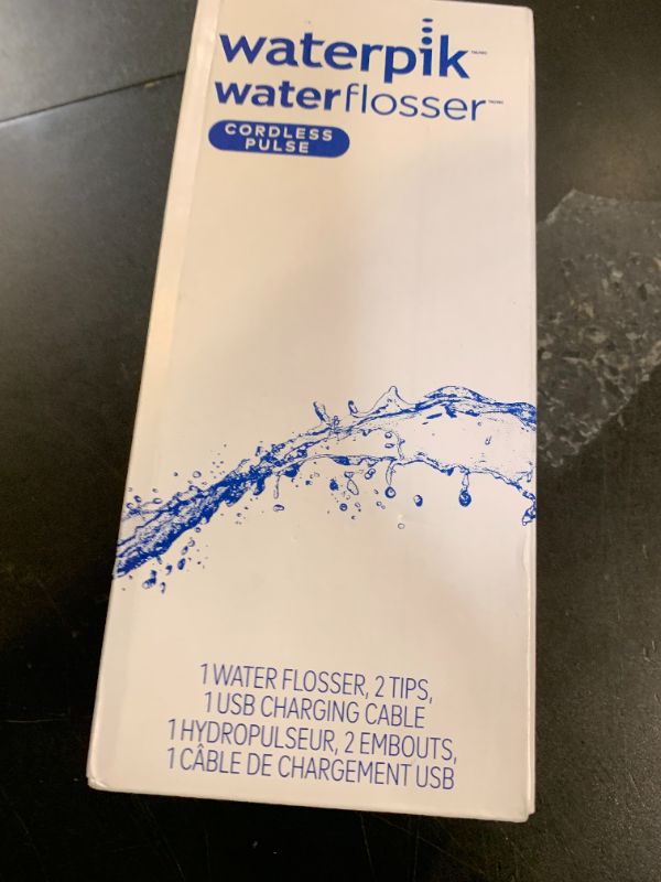 Photo 1 of Waterpik Cordless Pulse Rechargeable Portable Water Flosser for Teeth, Gums, Braces Care and Travel with 2 Flossing Tips, Waterproof, ADA Accepted, WF-20 Blue, Packaging May Vary