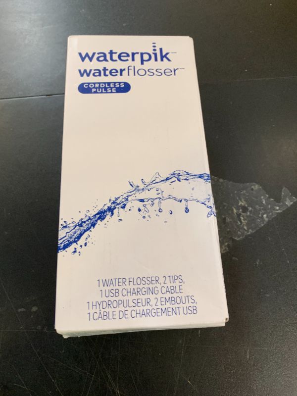 Photo 1 of Waterpik Cordless Pulse Rechargeable Portable Water Flosser for Teeth, Gums, Braces Care and Travel with 2 Flossing Tips, Waterproof, ADA Accepted, WF-20 Blue, Packaging May Vary