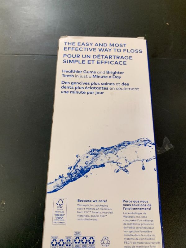 Photo 1 of Waterpik Cordless Pulse Rechargeable Portable Water Flosser for Teeth, Gums, Braces Care and Travel with 2 Flossing Tips, Waterproof, ADA Accepted, WF-20 Blue, Packaging May Vary