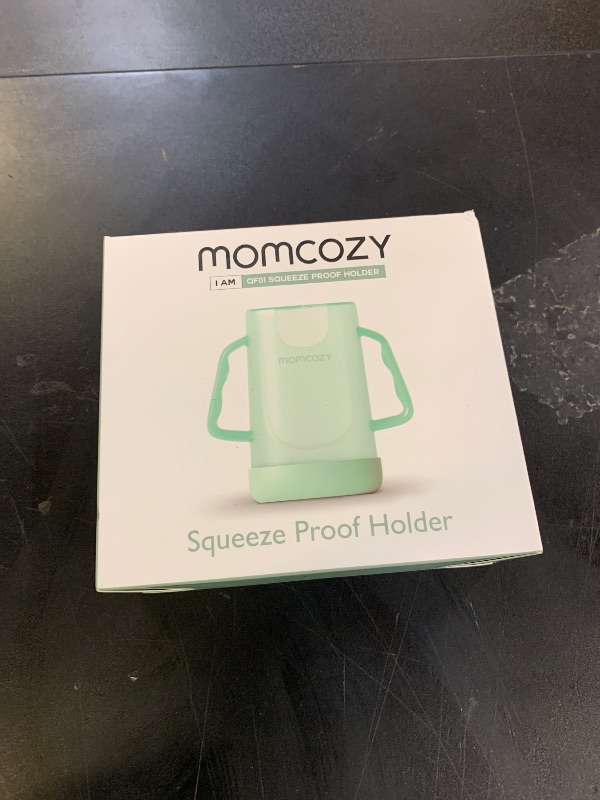 Photo 1 of Momcozy Squeeze Pouch Holder for Food Pouches and Drink Boxes, Baby Pouch Holder Allows Baby to Self-Feed and Avoid Messes, Baby Food Pouch Holder Handle is Easy to Grip, Comfortable, Green