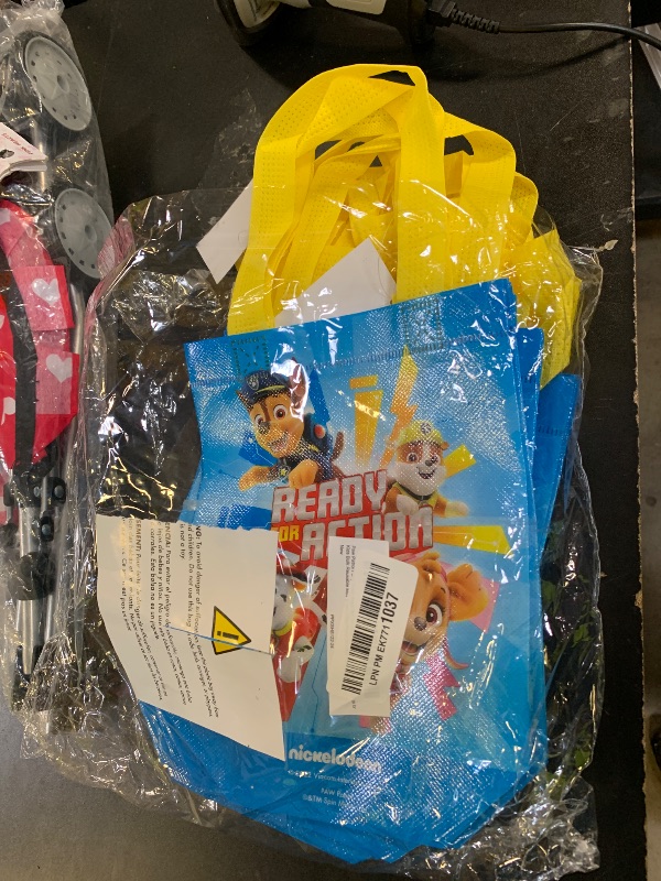 Photo 1 of Paw Patrol Party Favor Bag Set – 24 Pack of 8" Party Goodie Bags, Bulk Reusable Mini Tote Bags | Chase, Marshall, Skye and Rubble Paw Patrol Birthday Supplies