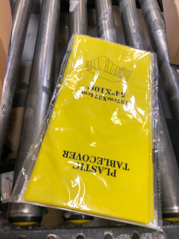 Photo 1 of QIKSION Plastic Table Cloth Disposable 2 Pack, 54 x 108 Inch Tablecloths for Rectangle Tables, Yellow Plastic Table Cover