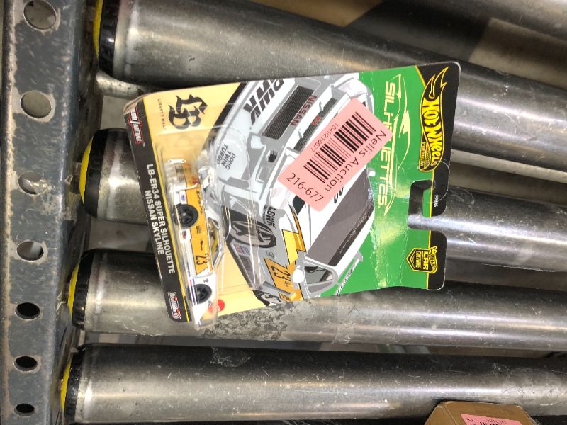 Photo 1 of Hot Wheels Premium Car Culture Collectible Toy Car, 1:64 Scale Die-Cast LB-ER34 Super Silhouette Nissan Skyline, Silhouettes Vehicle with Real Riders Tires