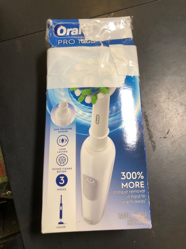 Photo 1 of Oral-B Pro 1000 Rechargeable Electric Toothbrush, White