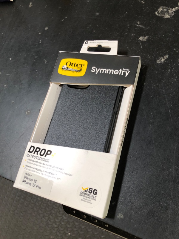 Photo 1 of OtterBox iPhone 12 & iPhone 12 Pro Symmetry Series Case - Black, Ultra-Sleek, Wireless Charging Compatible, Raised Edges Protect Camera & Screen